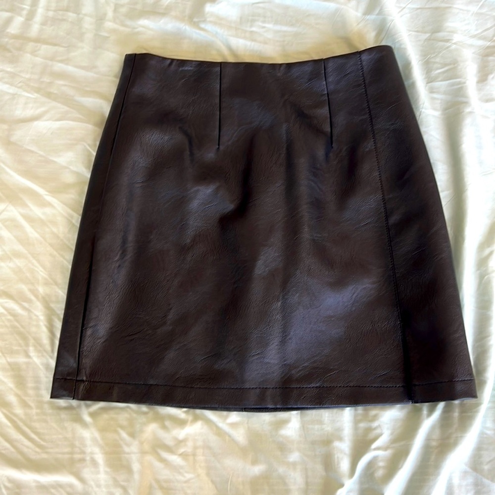 Black faux leather skirt. Size 6.